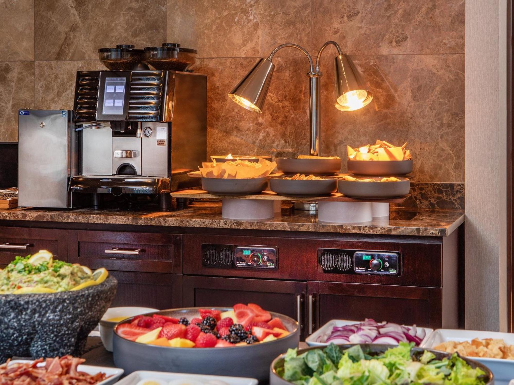 Intercontinental Boston By Ihg Hotel Bagian luar foto A coffee machine at a buffet